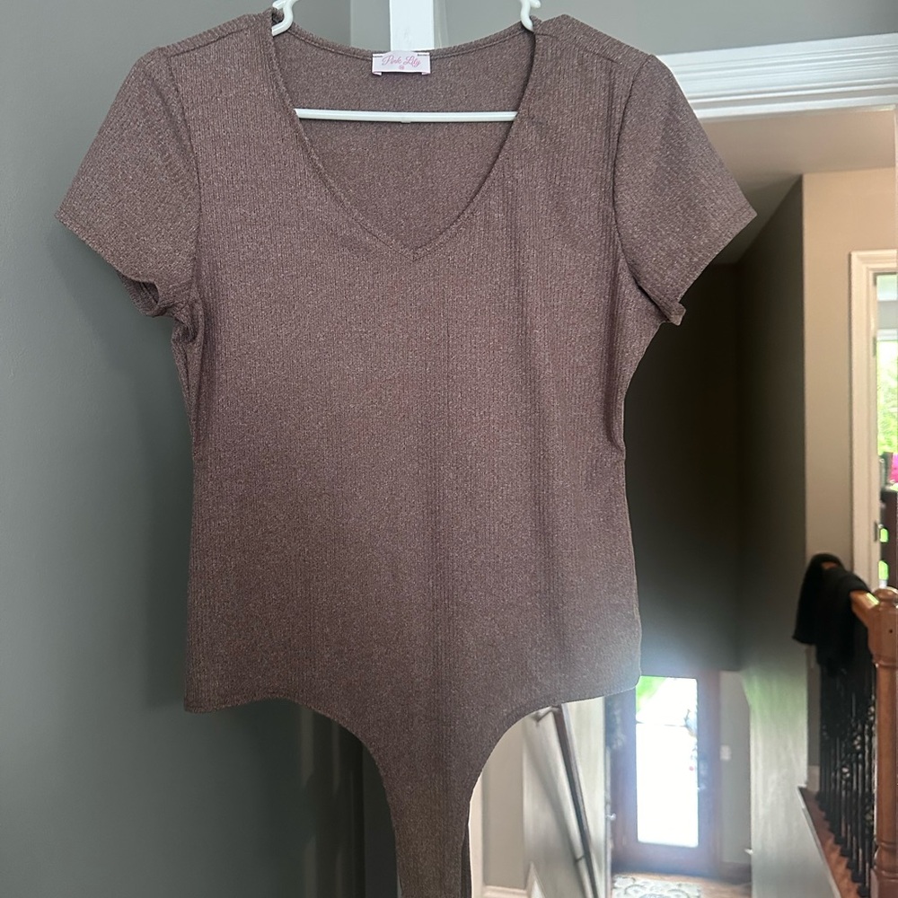 Pink Lily T-shirt Body Suit, never worn. Perfect condition.